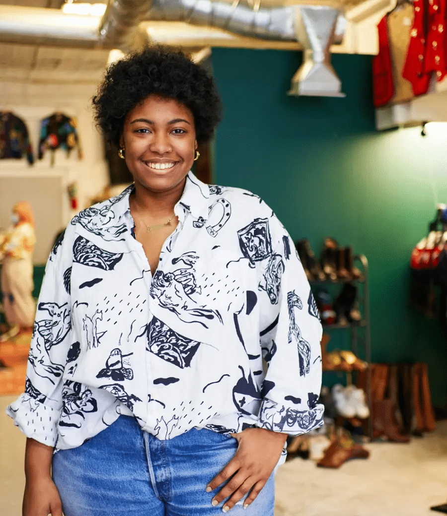 Smiling woman standing in store